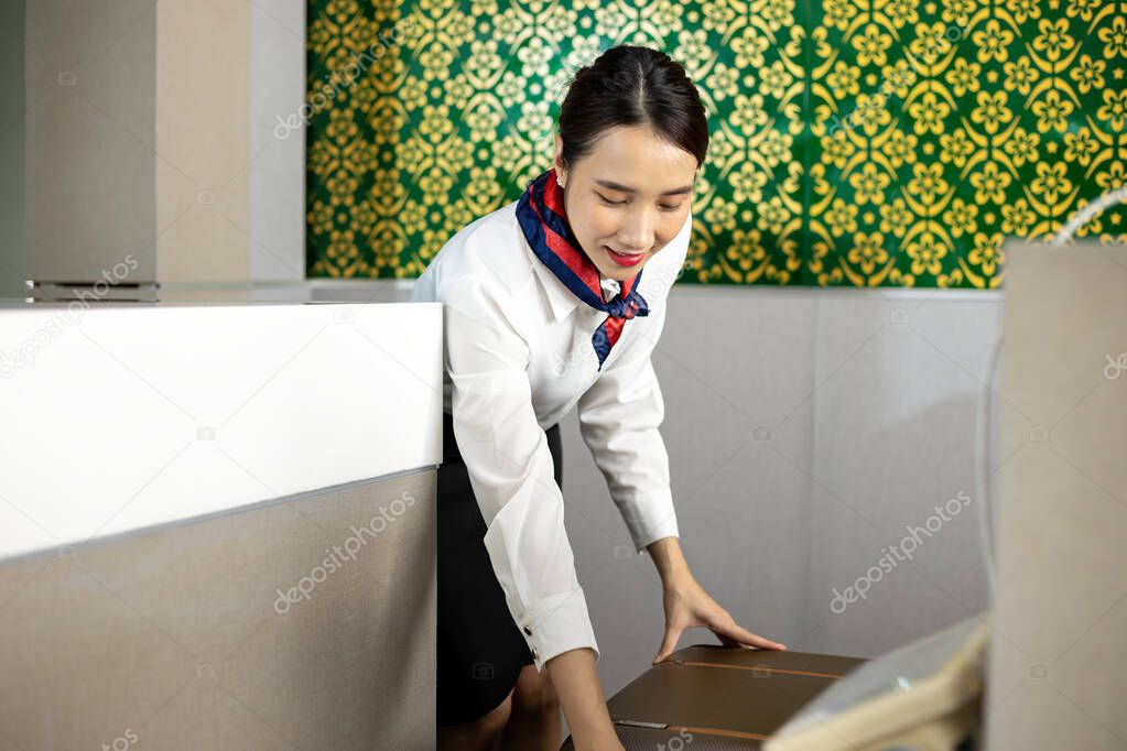 Friendly staff member helping visitors choose things to do